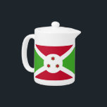 Tekanna med flagga Burundi<br><div class="desc">Lägg till ett litet burundiskt pride till din tetid med vår exklusiv tekanna med flagga Burundi! Denna tekanna är mycket detaljerad och är mer än bara ett funktionellt köksföremål. Den är en firande av Burundis kulturarv och kulturella pride. Den sjudande designen visningar den ikoniska burundiska flagga och skapar den här...</div>
