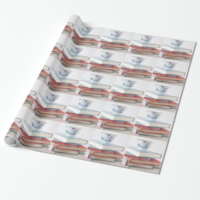 Tekopp på bokbunt presentpapper (Utrullad)