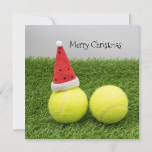 Tennis boll med julhatt för jul julkort