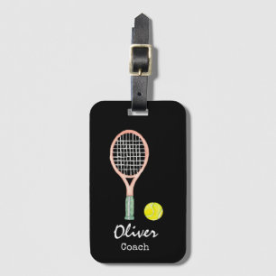 Tennis bollar och racketar på svarta säckar märkre bagagebricka