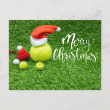Tennis God jul med boll på grönt