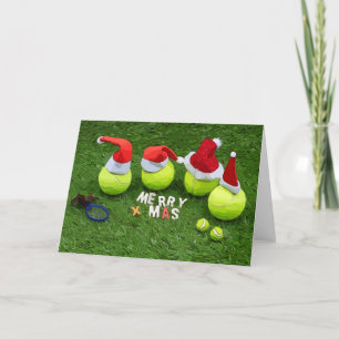 Tennis-jul med tennis boll och Santa hat Helgkort
