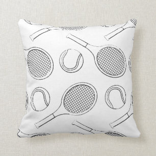 Tennis racket och boll svart på vitt kudde