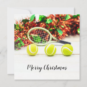 Tennisboll och racket med juldekoration kort