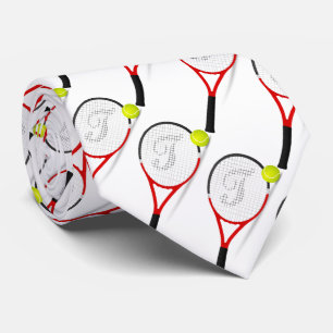 Tennisracketar och boll för sportmannar på vita slips