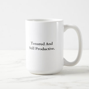 Tenured och stilla produktivt kaffemugg