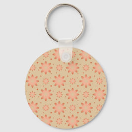Terrakotta orange och sandbeige ömtaklig tusenskön nyckelring