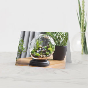 Terrarium med vattenfall och växter kort