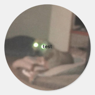 test runt klistermärke