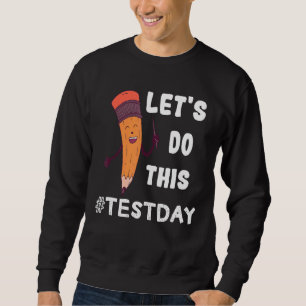 Testdagsläraren får inte utföra testdagstester lång ärmad tröja