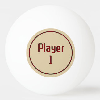 Text 'Spelare 1' i djupröd på beige Pingisboll