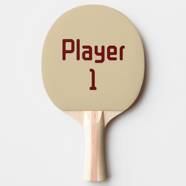 Text 'Spelare 1' i djupröd på beige Pingisracket (Framsidan)