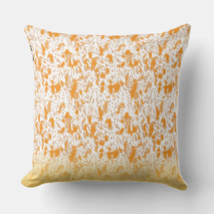 Textil mönster med en levande orange och ett sunt kudde