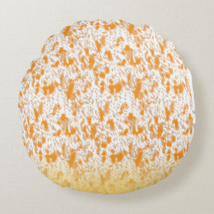 Textil mönster med en levande orange och ett sunt rund kudde