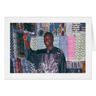 Textilsäljare på den Banjul marknaden Hälsningskort