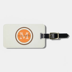 Texturerad kräm- bakgrundsorangeMonogram Bagagebricka