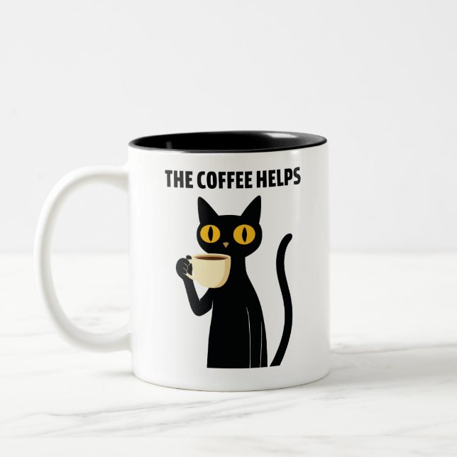 The Coffee Helps – Cute Black Cat Coffee Mug Två-Tonad Mugg (Vänster)