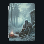 The Frozen Wanderer iPad Mini Skydd<br><div class="desc">In a secluded, frost-covered forest, a mysterious Frost Elf sits by a small campfire, wrapped in a thick fur-lined cloak. Her silver hair contrasts against the icy landscape as she gazes into the flickering flames, lost in thought. Behind her, an ancient rune-engraved monolith, covered in frost, stands as a silent...</div>