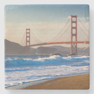 The Golden Gate Bridge från Baker Beach Underlägg Sten
