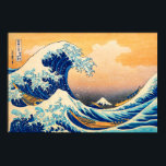 The Great Wave off Kanagawa by Katsushika Hokusai Poster<br><div class="desc">Bring timeless drama to your space with The Great Wave off Kanagawa by Katsushika Hokusai. Created in 1831, this iconic Japanese masterpiece captures the raw energy of the sea as towering waves rise above small boats, while Mount Fuji appears calmly in the distance. Hokusai’s bold composition, flowing lines, and striking...</div>