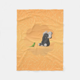 The parrot meets a stuffed elephant fleece blanket