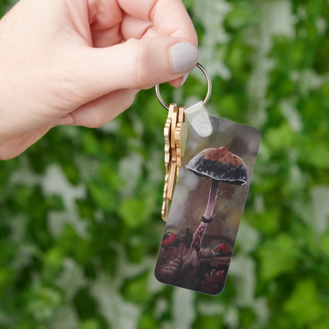 The Wounded Mushroom Nyckelring (Hand)