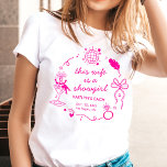 This Wife Is A Showgirl Bachelorette Party T Shirt<br><div class="desc">Get ready to trade the feathers for a veil! Celebrate the bride-to-be in true Las Vegas style with this custom bachelorette party t-shirt. Featuring a chic, retro-inspired illustration of a showgirl in a martini glass, disco ball, and a whimsical bow, this design captures the glitz and glamour of a classic...</div>