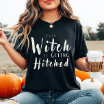 This Witch Is Getting Hitched Bridal Tee<br><div class="desc">This “This Witch Is Getting Hitched” t-shirt is designed for the bride-to-be, making her the star of any Halloween bachelorette party or spooky bridal shower. Featuring bold white lettering on a sleek black tee, it’s a fun and festive way to celebrate her upcoming wedding. Be sure to check out the...</div>