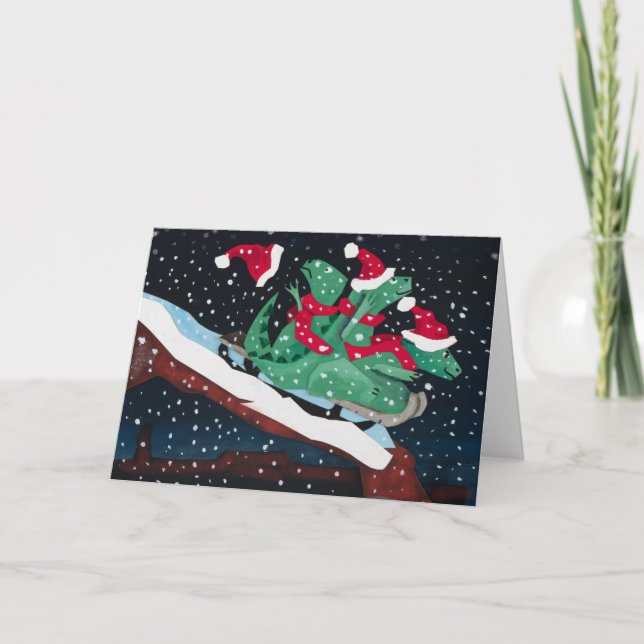 Three sledding dinosaurs helgkort (Framsida)