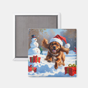 Tibetansk Spaniel som springer i snö med julhatt Magnet
