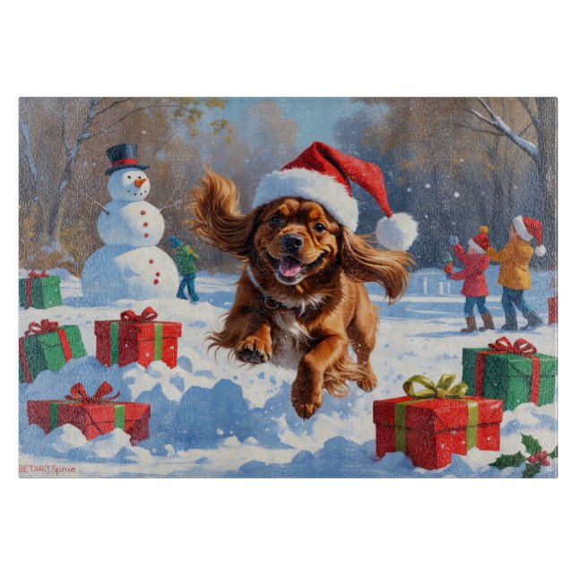 Tibetansk Spaniel Springar i Snö med Julhatt (Framsidan)