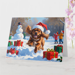 Tibetansk Spaniel Springar i Snö med Julhatt Kort