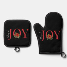 TIDINGARNA AV JOY RED CHRISTMAS POINSETTIA PÅ BLAC