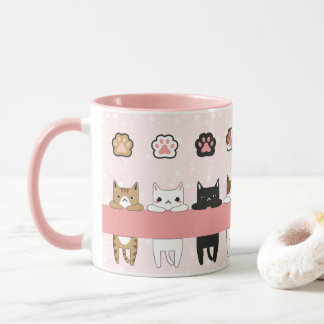 Tiernos gatitos en fondo rosa con flores mugg