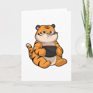 Tiger åtande med skål kort
