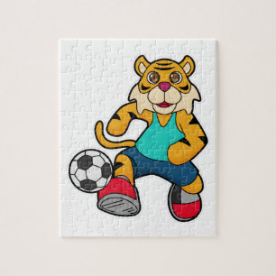 Tiger som fotbollsspelare med fotboll pussel