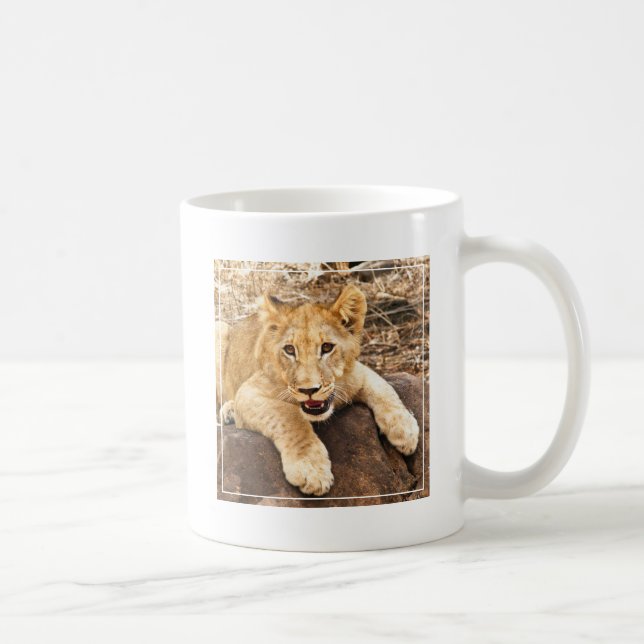 Tigerungen tar luftventilen på en sten kaffemugg (Höger)
