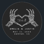 Till Death Halloween Wedding Favor Stickers Runt Klistermärke<br><div class="desc">Det här är en gotisk inspirerad bröllopsdekal med skelett händer och en moody mörk. Redigera de flesta formuleringar   ALL färg för att anpassa det här moody bröllopsprogrammet till ditt händelsebehov   stil personligen. Välj "anpassa den här mallen" om du vill visa alla redigeringsalternativ:)</div>