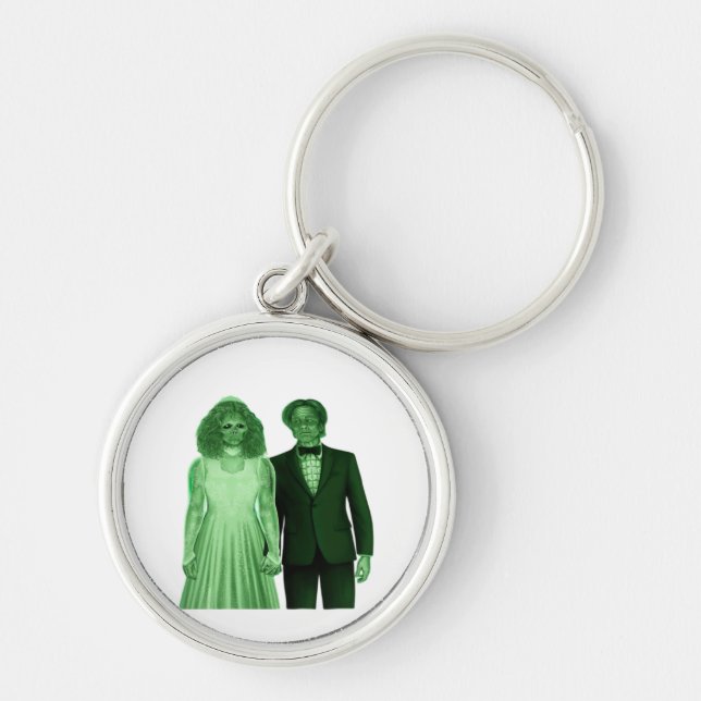 Till Döden gör oss del Classic Design Rund Silverfärgad Nyckelring (Framsidan)