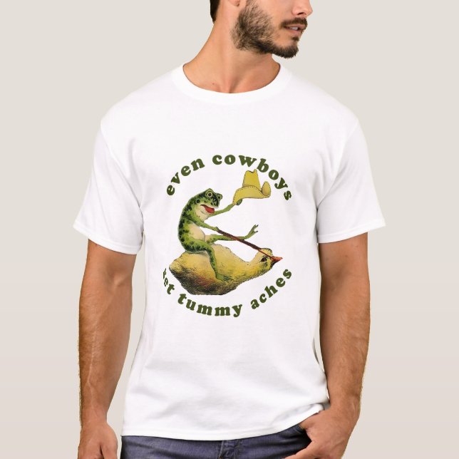 Till och med Cowboys får Tummy Aches Shirt. Lustig T Shirt (Framsida)