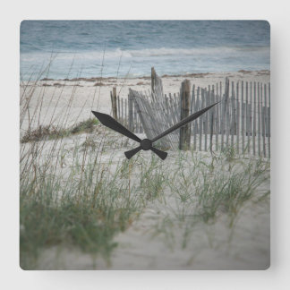Time för stranden kvadrerar väggen tar tid på fyrkantig klocka