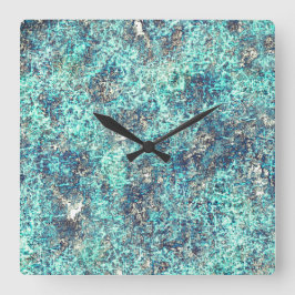 Tinkel av trådar eller svampar cyanblått och grått fyrkantig klocka