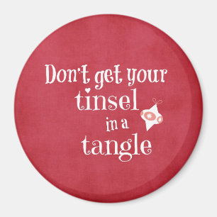Tinsel i en julklapp magnet