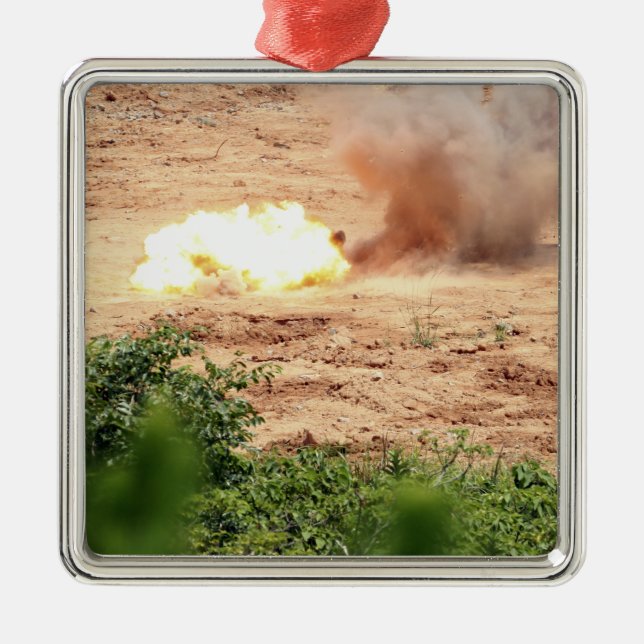 Tio halvpund block av TNT Julgransprydnad Metall (Framsidan)