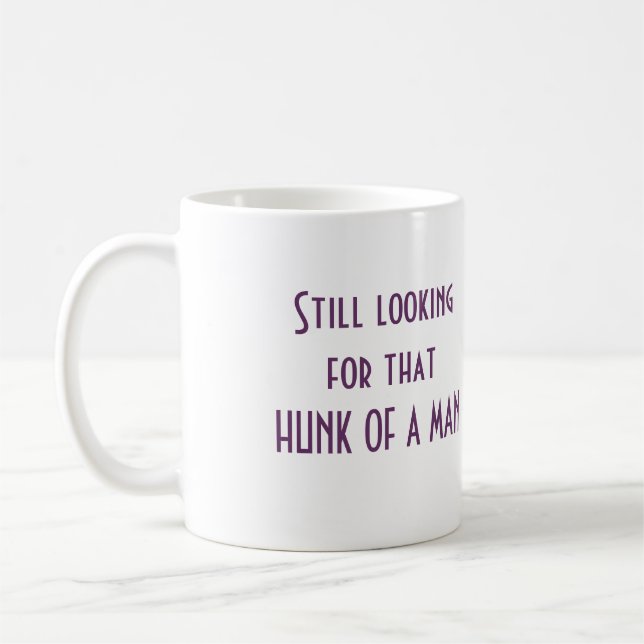 Tittar fortfarande kaffemugg (Vänster)