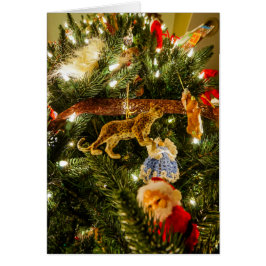 Tittar upp Julgran OBS Kort