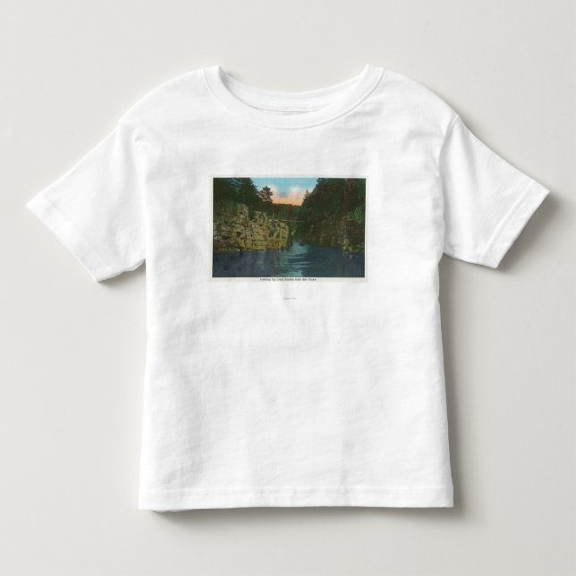 Tittar upp långa forar från flumen tee (Framsida)