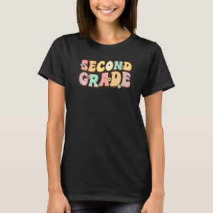 Tjejigt elev i andra klass lärare i 2:a klass baki t shirt