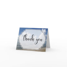 Tjock moln över bågfoto med Tacken Badge