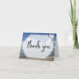 Tjock moln över bågfoto med Tacken Badge Tack Kort